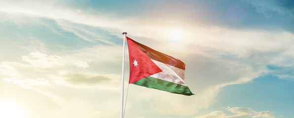 Waving Flag of Jordan with beautiful Sky.