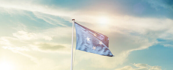 Waving Flag of Micronesia with beautiful Sky.