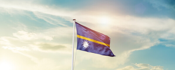 Waving Flag of Nauru with beautiful Sky.
