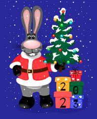 Black water rabbit in Santa Claus costume with presents, holding a Christmas tree