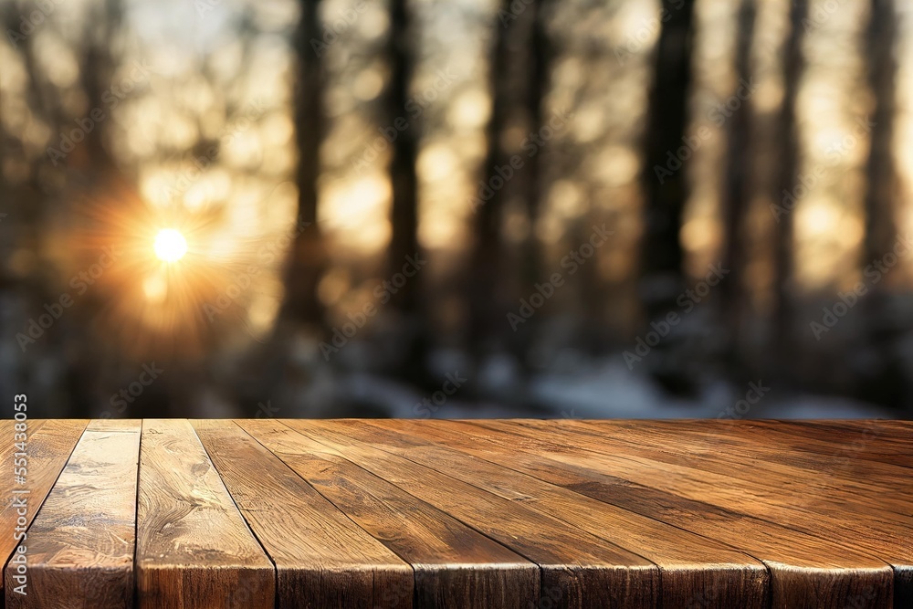 Poster a wooden table top with a blurry background of trees in the background and a sun setting in the dist