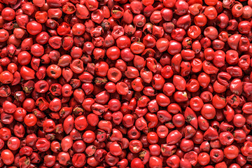 Red pepper peppercorn full frame texture or background.