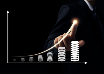 Businessman hand drawing increasing graph with money coins, Business investment profit concept.