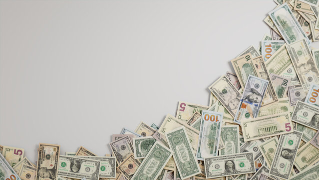 Mixed Denomination Bills Border on White Surface. Wealth Background with copy-space.