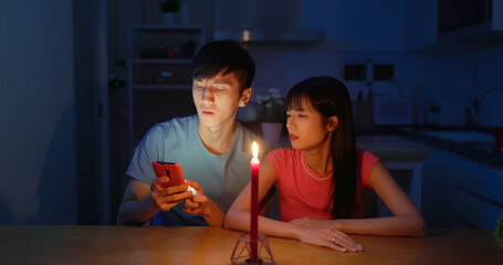 asian couple with power outage