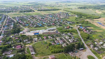 view from a height of a small village in summer