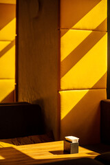 empty cafe with yellow wall