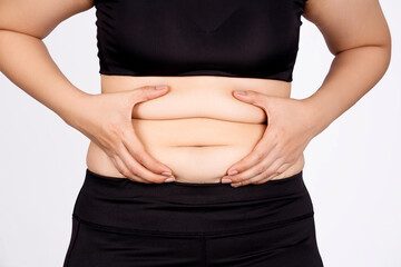 Abdominal surface of fat woman on white background.
