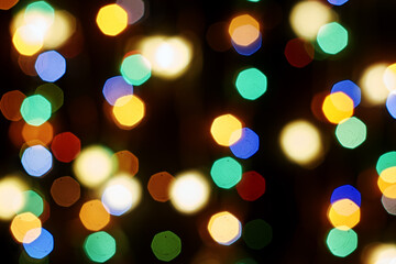 multicolored festive lights on a black background screensaver backdrop