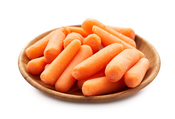 close up pile of baby small carrots in wood plate isolated on white background. small baby carrots,...