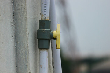 Valves or taps attached to pipes to open and close flow