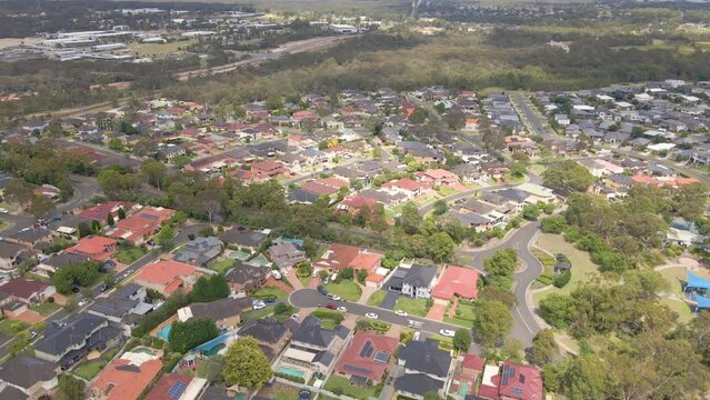 Aerial drone view of Voyager Point in South West Sydney, NSW Australia showing development of housing and parks  