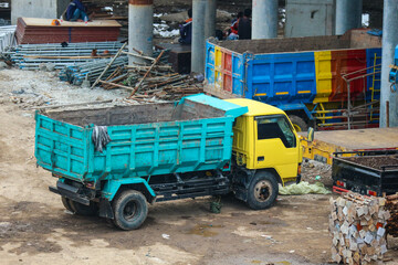 Jakarta, Indonesia in July 2022. Heavy vehicles in the form of dump trucks and other vehicles are parked