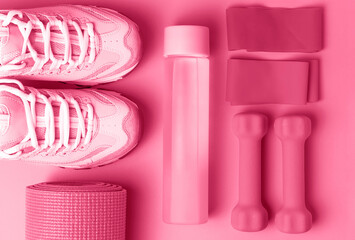 Sneakers and sports accessories trend color 2023  close-up, top view.