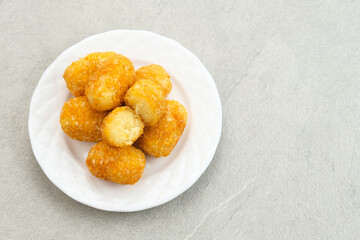 Gethuk Goreng, Indonesian traditional food, made from mashed cassava, and sprinkled with grated coconut.
