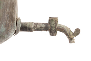 Faucet of old dirty Russian samovar in a cobweb.
