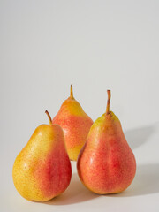 Green pear with a leaf isolated on white. Pear Clipping Path. Professional studio photo