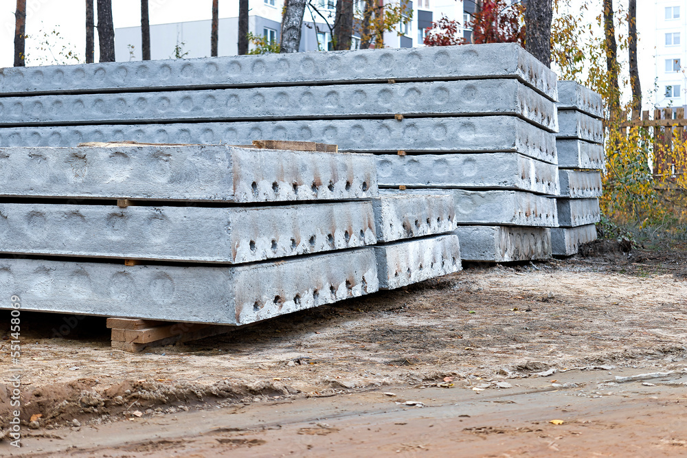 Poster reinforced concrete floor slabs are stored at the construction site. close-up. reinforced concrete b