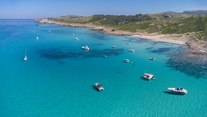 pleasure boats at anchor , Arenalet d Aubarca protected natural area, capdepera, Mallorca, Balearic...
