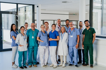 Portrait of happy doctors, nurses and other medical staff in hospital.
