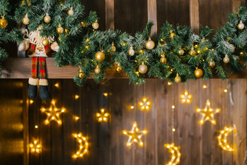 Christmas decor of wooden furniture with garlands