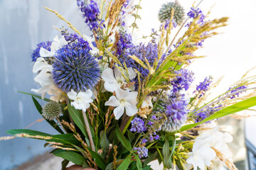 a bouquet of winter flowers in your hands