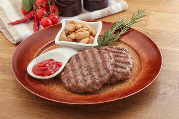 Grilled beef burger cutlet with sauce