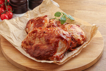 Marinated chicken leg in tomato sauce