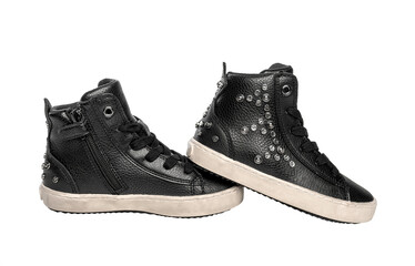 Stylish black leather sneakers on a white background.