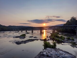 Aerial Sunrise Over Potomac River and Railroad Bridge at Harpers Ferry, West Virginia