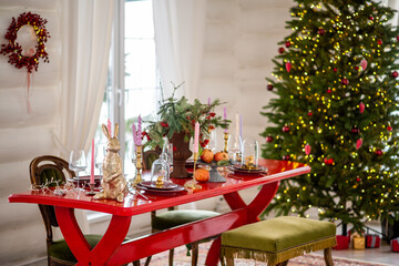 large table decorated for Christmas and New Year