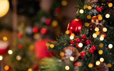 Fototapeta premium Beautiful and decorated Christmas tree in the mirror reflection. Christmas mood. Great photo for greeting cards.