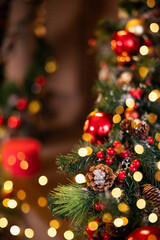 Fototapeta na wymiar Christmas background, red and gold wallpaper. Beautiful bokeh lights