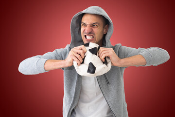 football fan with a deformed ball