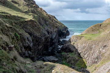 Soapy Cove on the lizard peninsular Cornwall showing water falls seals and their pups 
