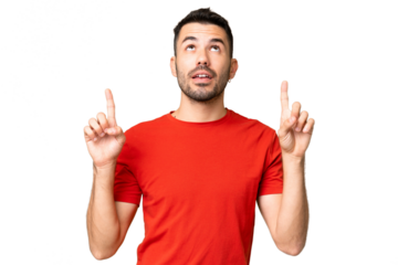 Young handsome caucasian man over isolated chroma key background surprised and pointing up