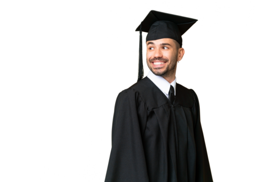 Young university graduate man over isolated chroma key background with arms crossed and happy
