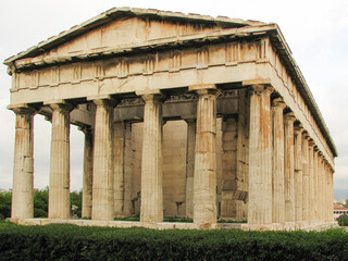 Athens, Greece - A front view of the Temple of Hephaestus, also known as Hephesteum, a well-preserved Greek temple that remains standing largely intact.  Image has copy space.
