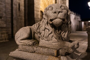 Selective focus shot of a lion statue at the Catedral de Avila in Spain