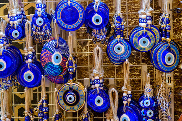 evil eye beads hanging on strings