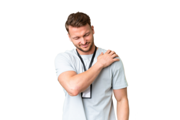 Young caucasian man with ID card over isolated chroma key background suffering from pain in shoulder for having made an effort