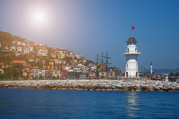 Fototapeta na wymiar Landscape of lighthouse in port Alanya, Turkey. Copy space.