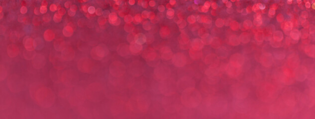 Blurred dark red sparkling background from small sequins for new year or christmas, macro.