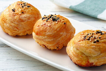 Homemade turkish piesl pogaca with sesame seeds