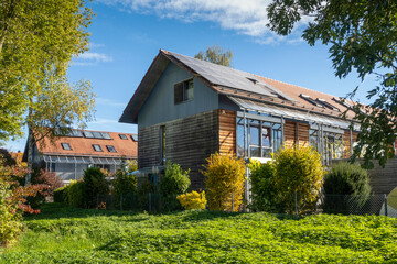 Germany, Bavaria, Munich, Yard behind modern energy efficient suburban houses
