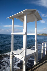 white  empty beach huts in Procida