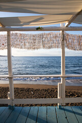 Fototapeta premium white empty beach huts in Procida