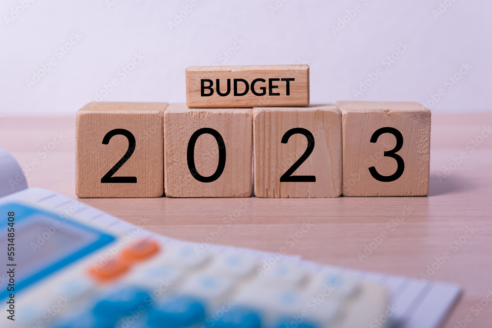 Aufkleber abstract wood cube building block with text budget 2023 on it