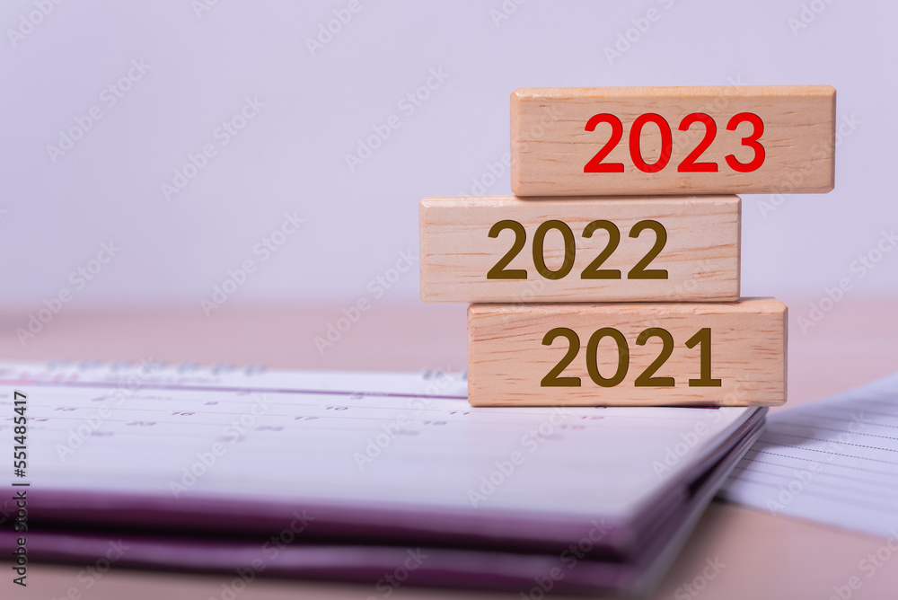 Poster abstract wood cube building block with text 2023 on it