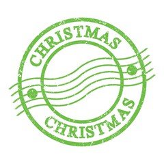 CHRISTMAS, text written on green postal stamp.